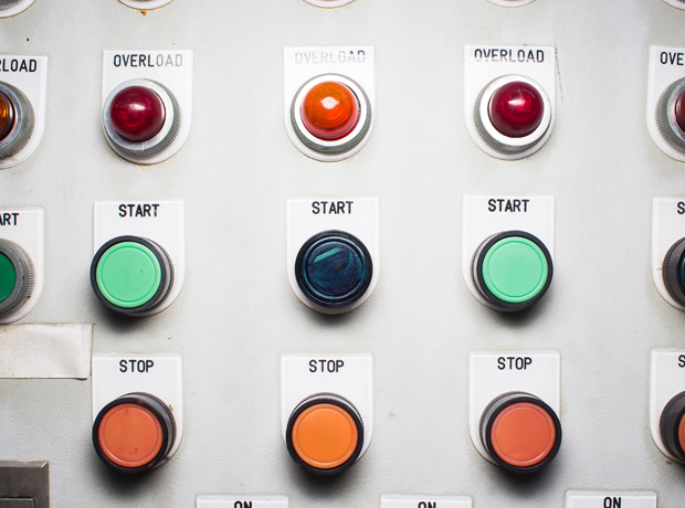 Board with rows of red lights labeled 