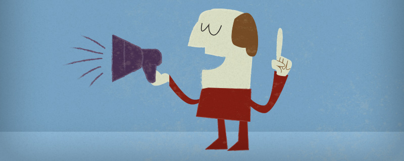 man speaking into megaphone