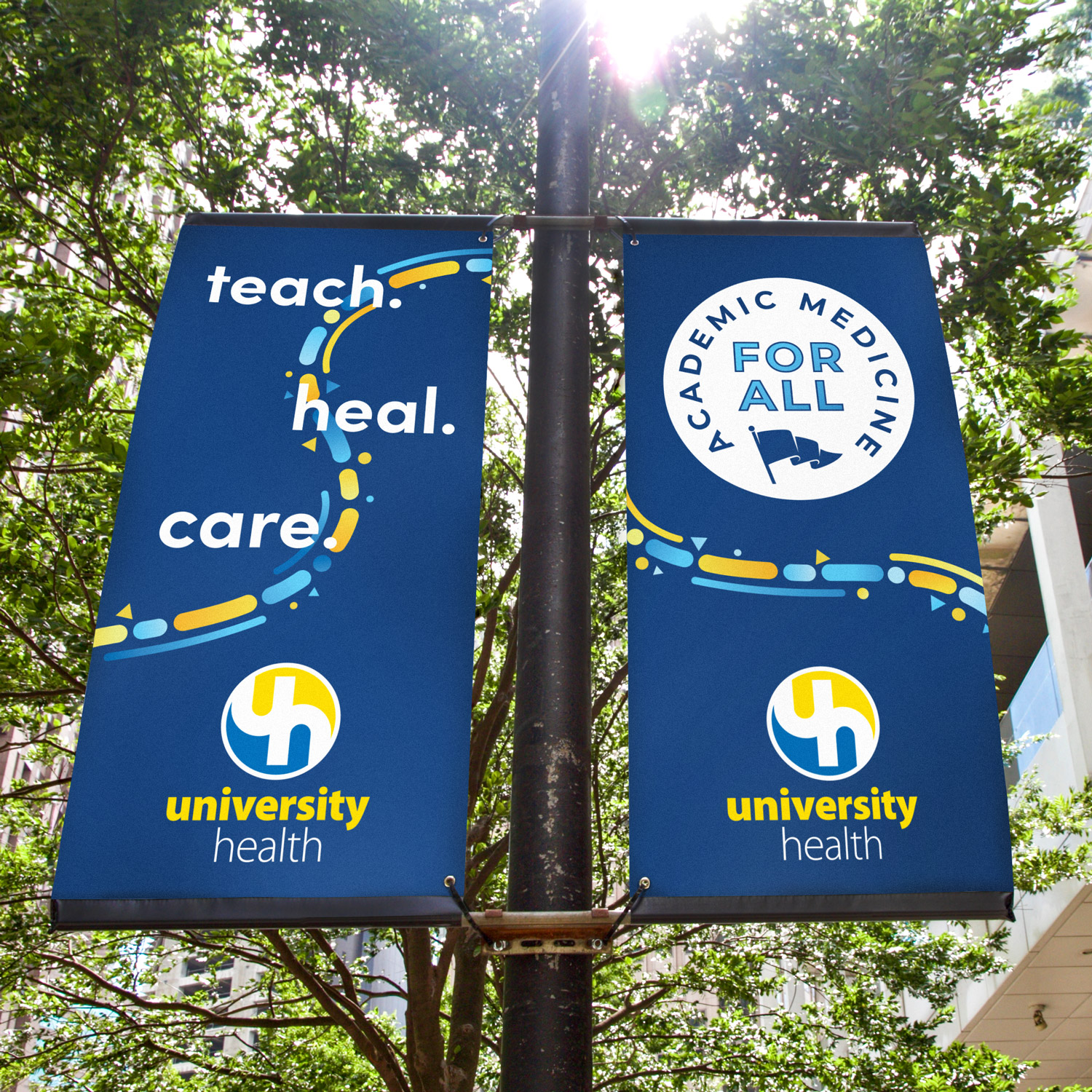 Light pole banners on the UH campus. says 