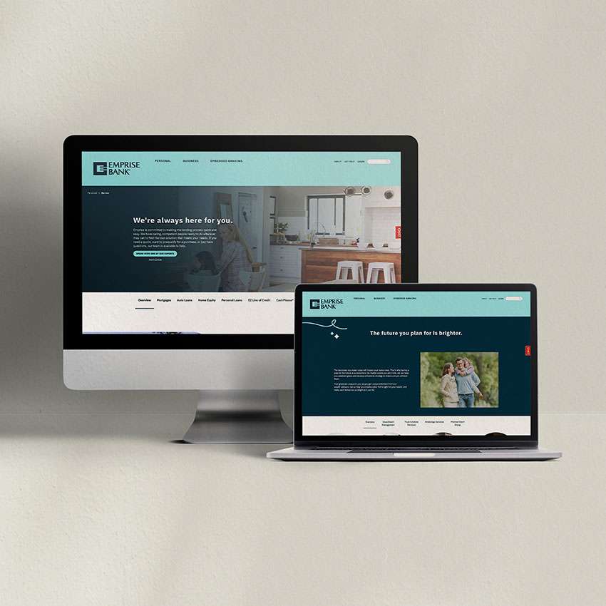 Desktop and laptop with browser windows open to emprisebank.com